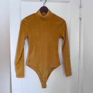 Modcloth Mustard Yellow Ribbed Mock neck Bodysuit. Size XS
